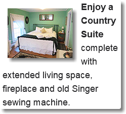 ﷯Enjoy a Country Suite complete with extended living space, fireplace and old Singer sewing machine. 